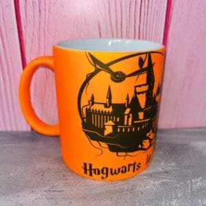 Taza Fluo Hogwarts