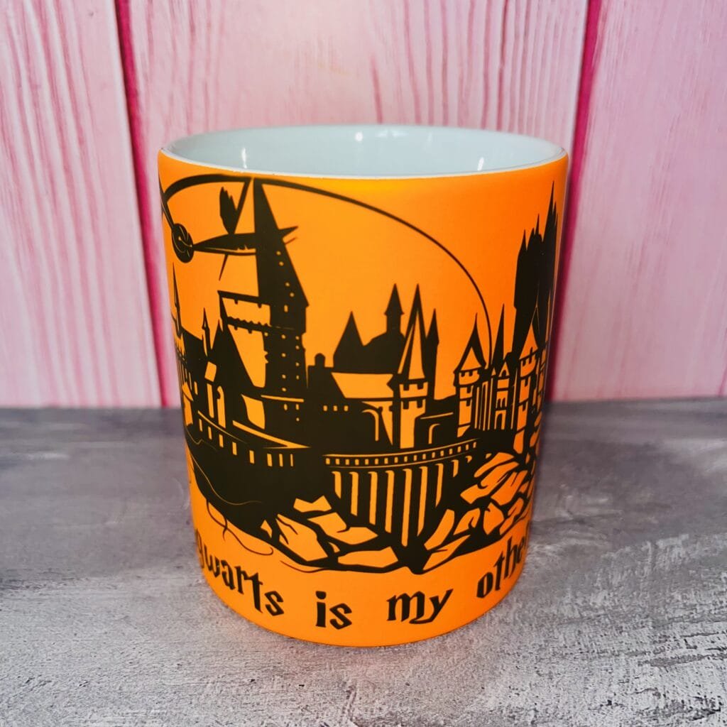 Taza Fluo Hogwarts